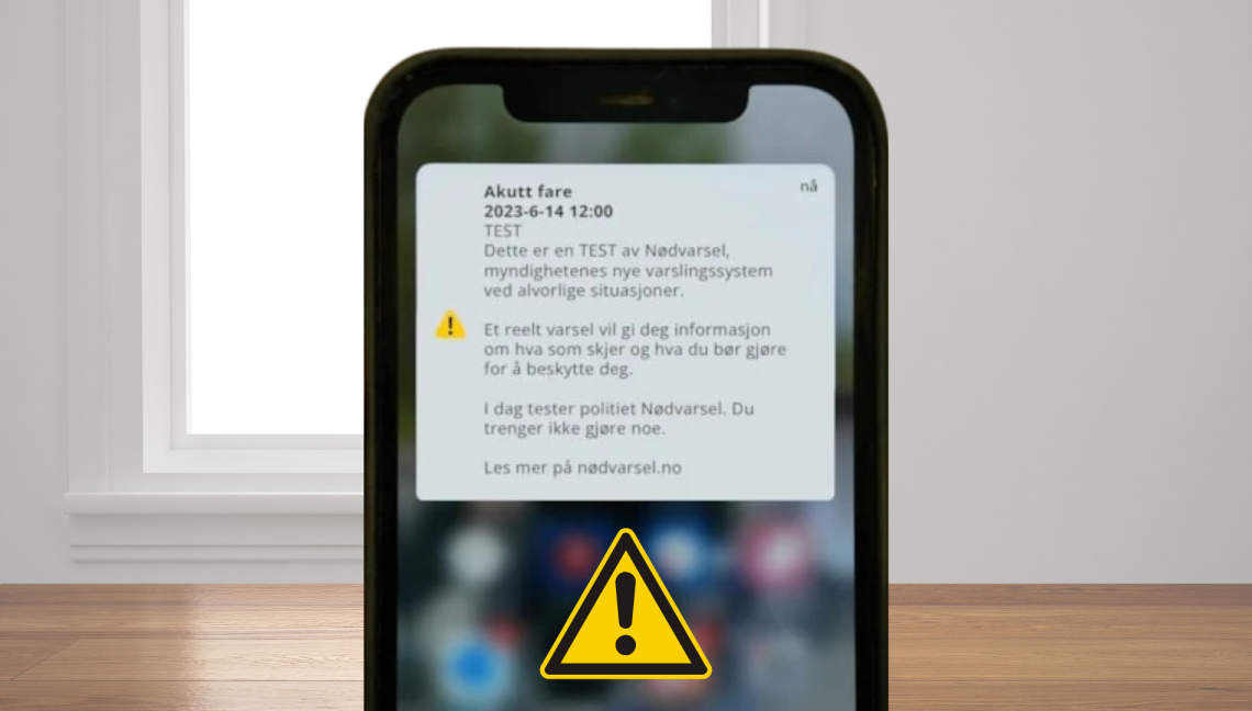 Mobil som viser nødvarsel. 